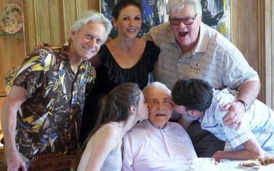 100 years young! Catherine Zeta-Jones shares heartwarming home videos of father-in-law Kirk Douglas with his grandchildren on milestone birthday